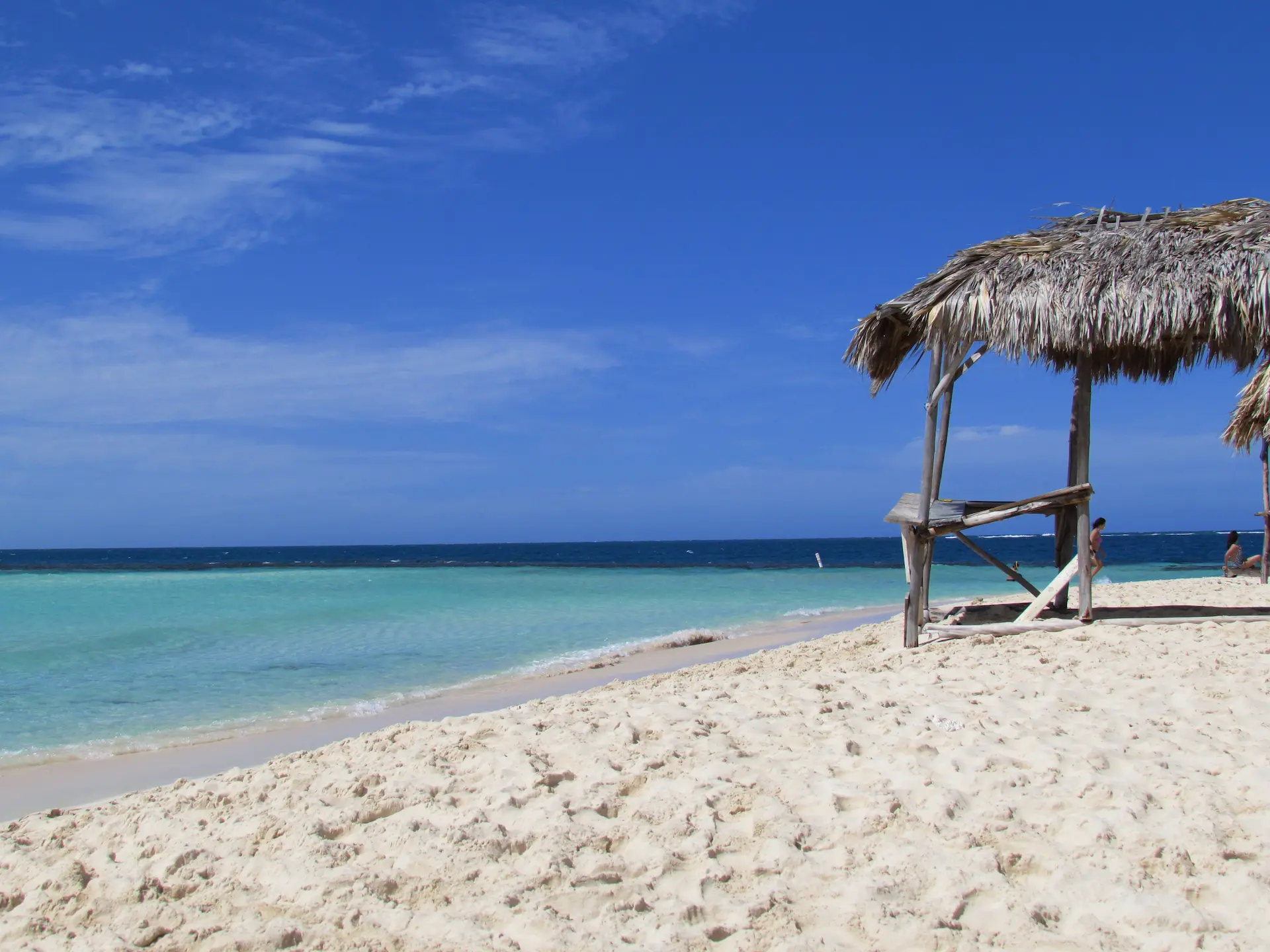 Rustic beach hut on the white sandy shore of Cayo Arena, Paradise Island, Dominican Republic