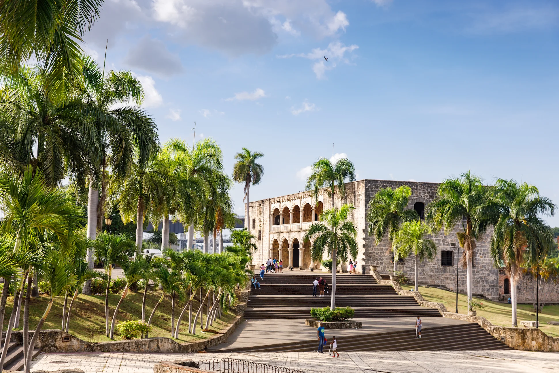 Alcazar de Colon surrounded by palm trees in the Colonial Zone of Santo Domingo Dominican Republic