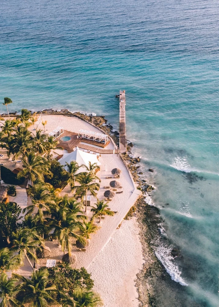 Aerial view of Bayahibe beach with pier and turquoise waters