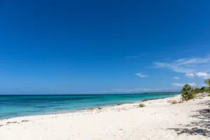 Cabo Rojo beach in Pedernales, Dominican Republic, with white sand and turquoise Caribbean waters.