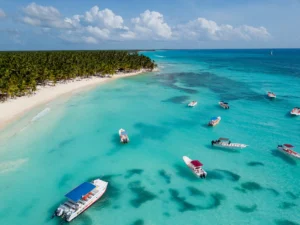 Tourists sailing on a catamaran in Isla Saona with blue sky and ocean