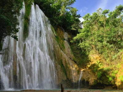El Limón Waterfall in Samaná, Dominican Republic, surrounded by tropical jungle.
