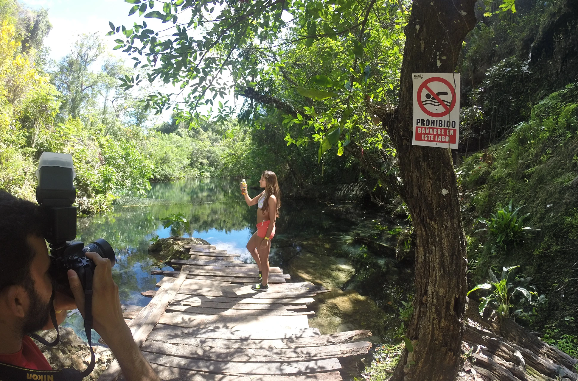 Traveler posing at photo spot near Dudú Lagoon