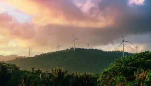 Wind turbines at Los Cocos Wind Farm in Pedernales, Dominican Republic during sunset.
