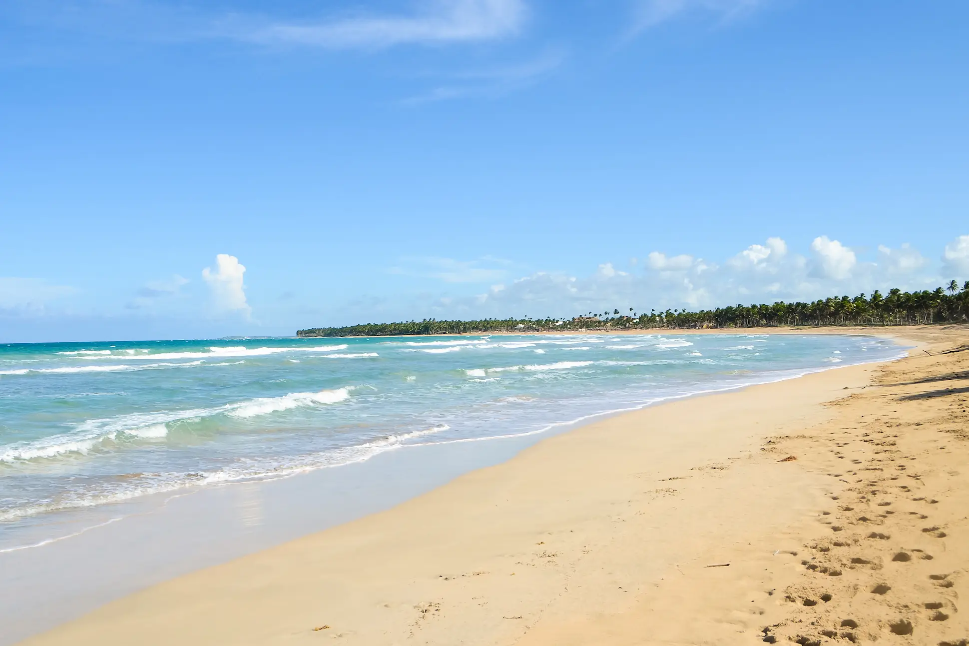 Macao Beach in Punta Cana, Dominican Republic, a public beach with golden sand and turquoise waters.