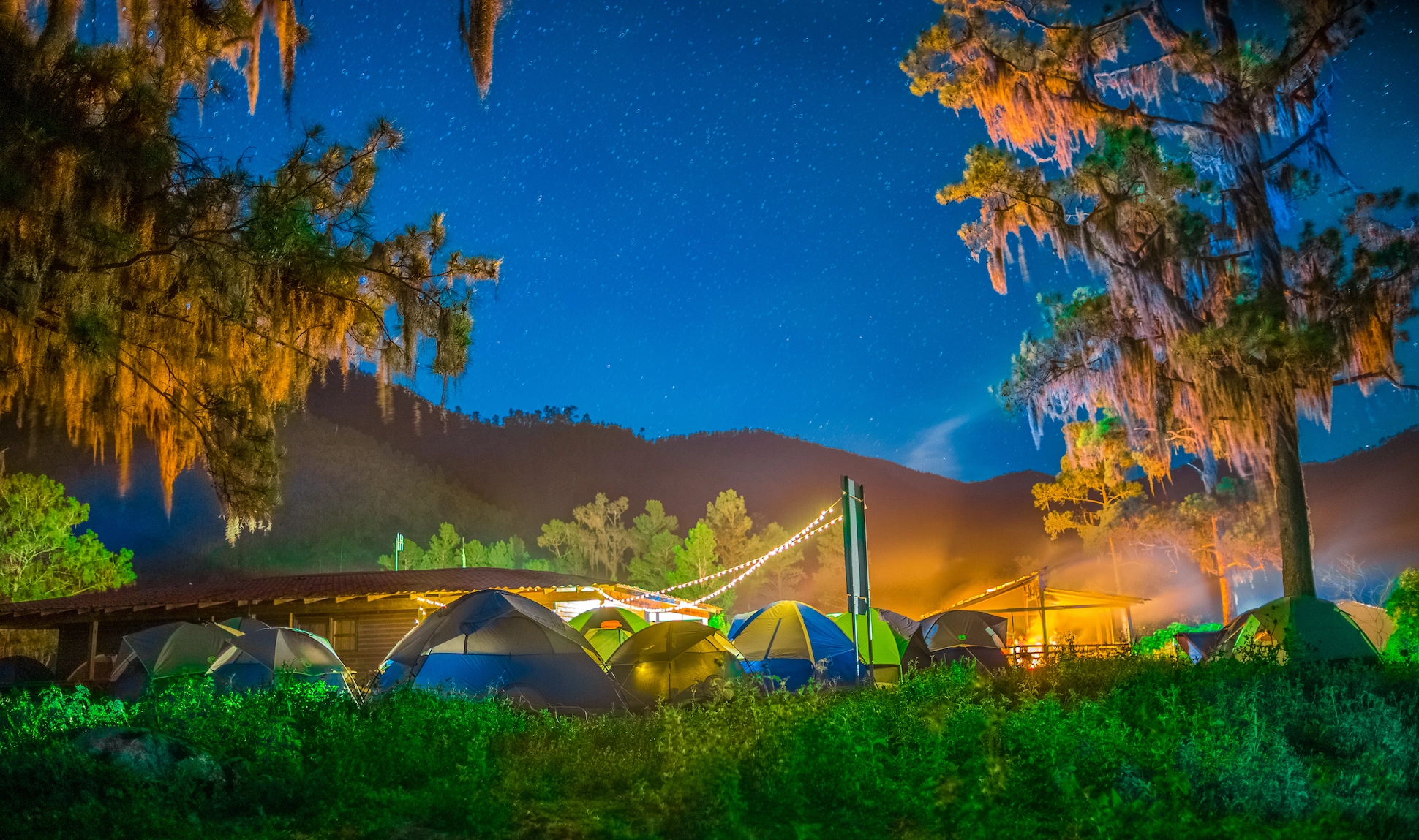 Camping tents under starry sky during Pico Duarte trek in Dominican Republic