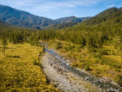 Mountain valley with river at Pico Duarte trekking route, Dominican Republic.