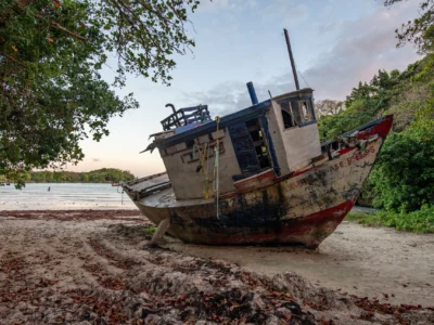 Stranded boat on the shore of Playa Diamante in Cabrera, Dominican Republic
