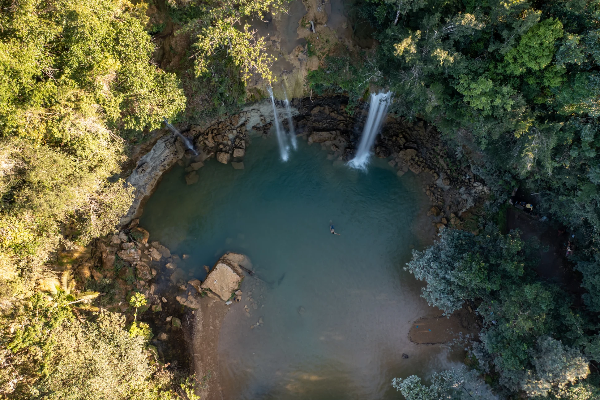 Aerial view of Salto Alto waterfall and natural pool in Bayaguana, Dominican Republic