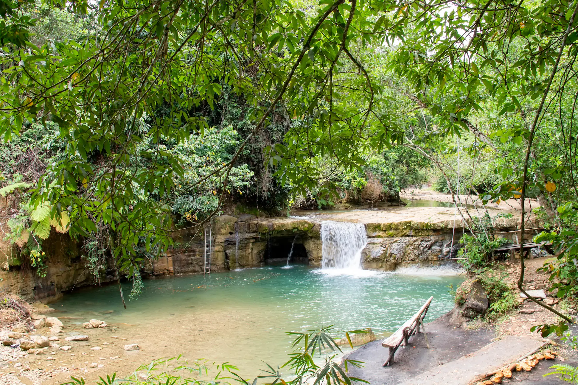 Salto de Yanigua waterfall surrounded by lush forest in El Valle, Hato Mayor, Dominican Republic
