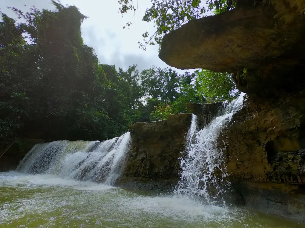 Salto de Yanigua waterfall surrounded by lush forest in Hato Mayor, Dominican Republic