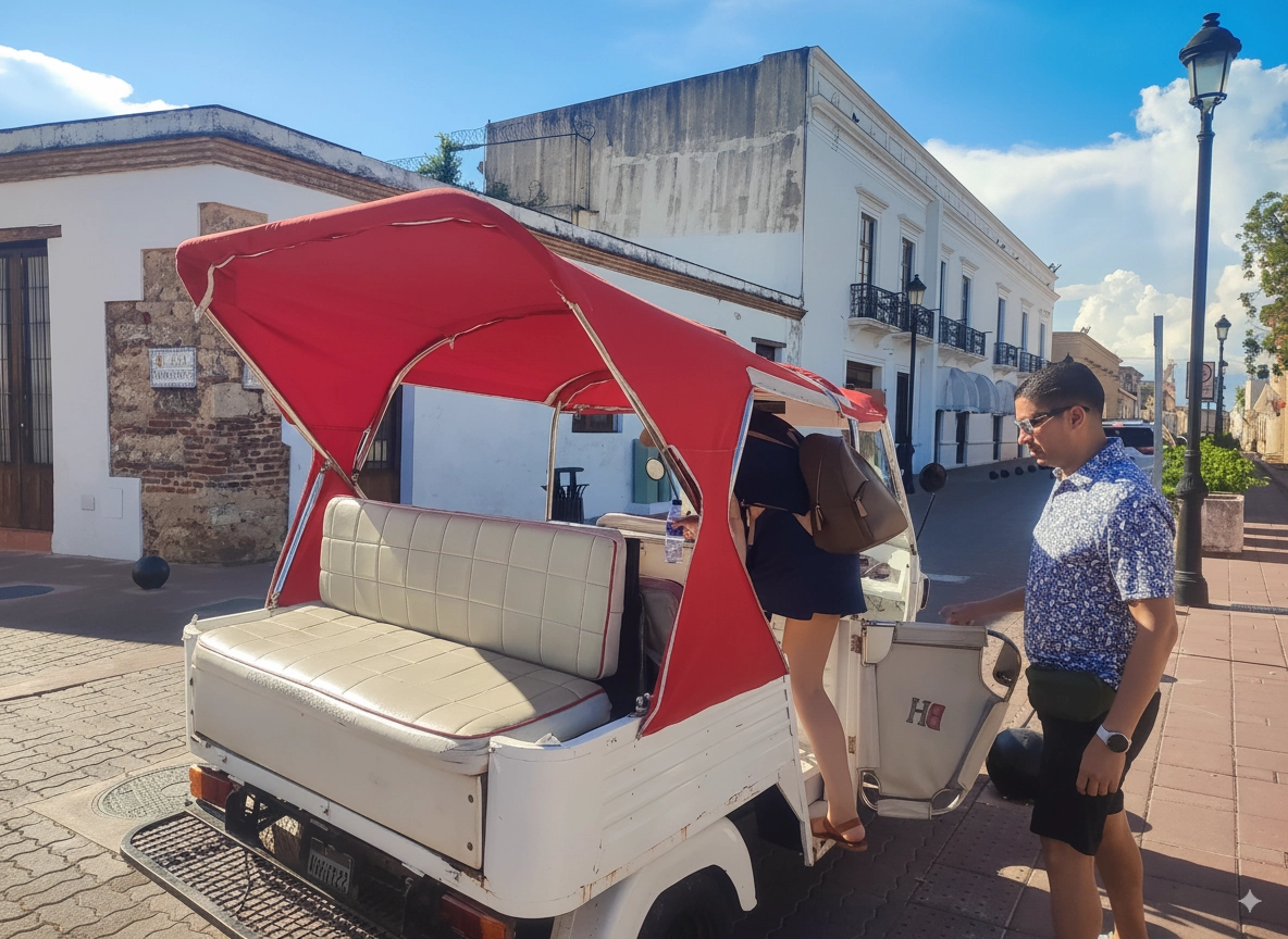 Tourists boarding a red-roof Tuk-Tuk in Santo Domingo’s Colonial Zone